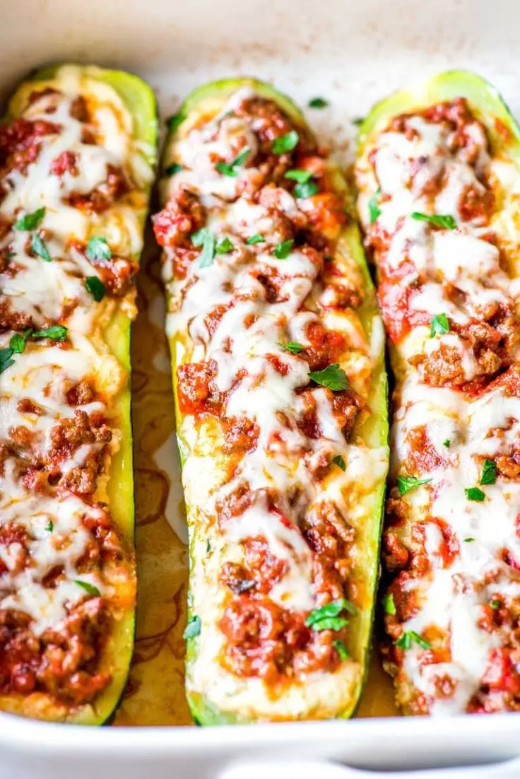 A baked zucchini recipe with red pasta sauce and ricotta ...