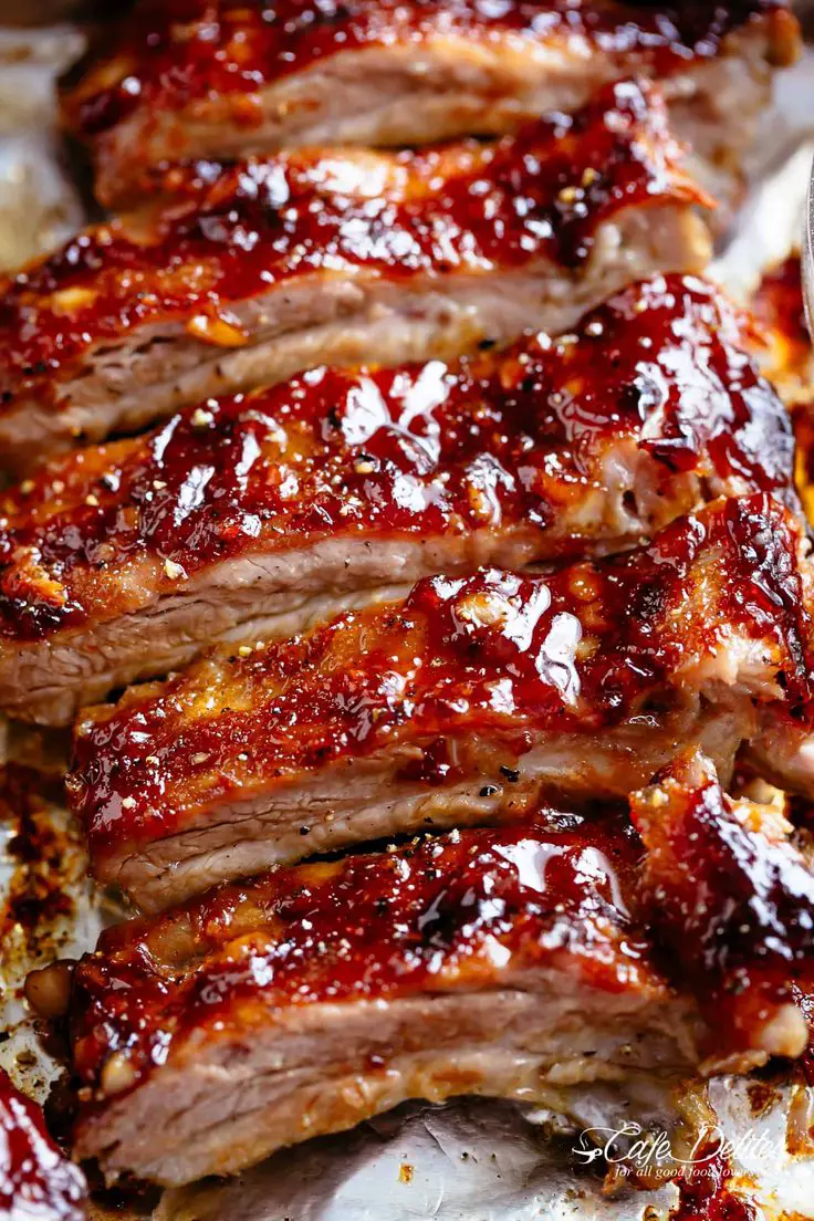American Ribs Oven Baked and slathered in the most delicious barbecue ...