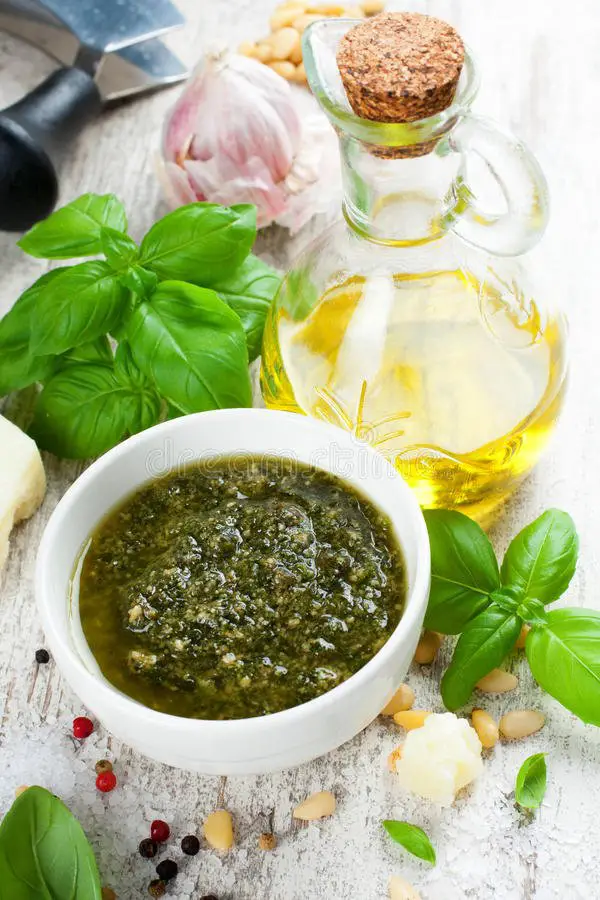 Basil Pesto Sauce And Fresh Ingredients Stock Photo