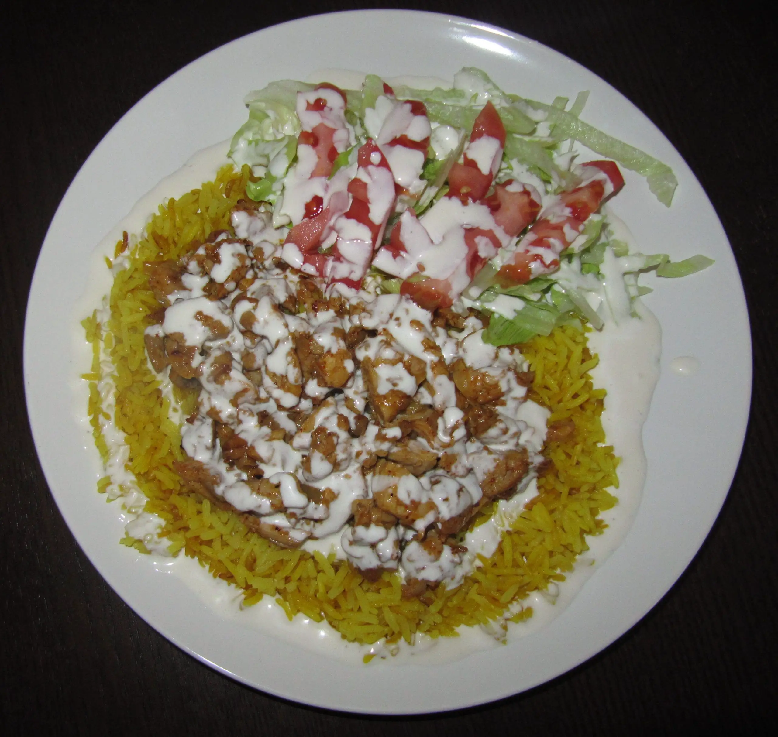 Halal Chicken over Rice, featuring the famous White Sauce