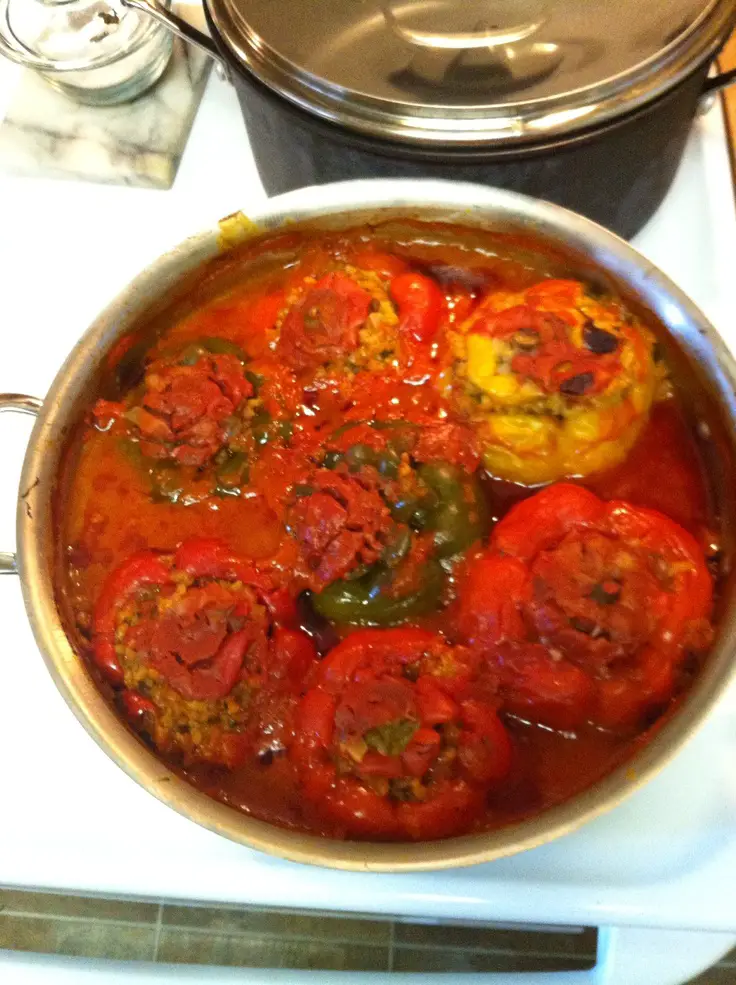 Stuffed bell peppers in tomato sauce ...
