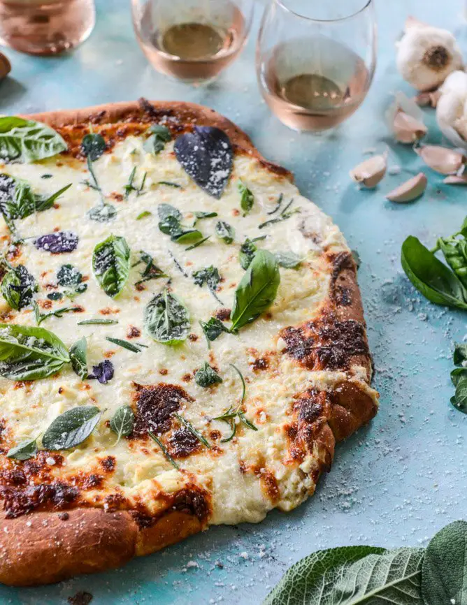 White Pizza with Garlic Sauce and Garden Herbs.
